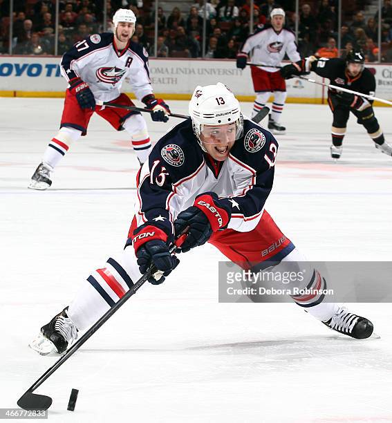Cam Atkinson of the Columbus Blue Jackets handles the puck during the game against the Anaheim Ducks on February 3, 2014 at Honda Center in Anaheim,...