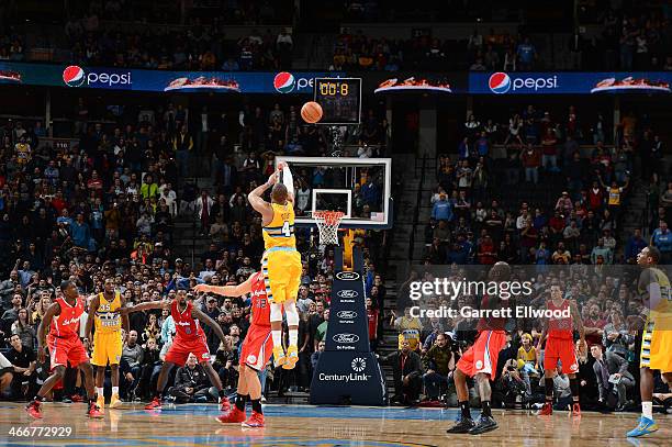Randy Foye of the Denver Nuggets hits the game winning shot against the Los Angeles Clippers on February 3, 2014 at the Pepsi Center in Denver,...