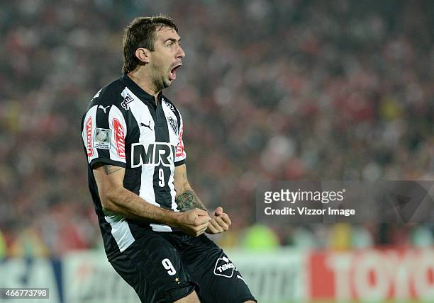 Lucas Pratto of Atletico Mineiro celebrates after scoring the opening goal during a match between Independiente Santa Fe and Atletico Mineiro as part...