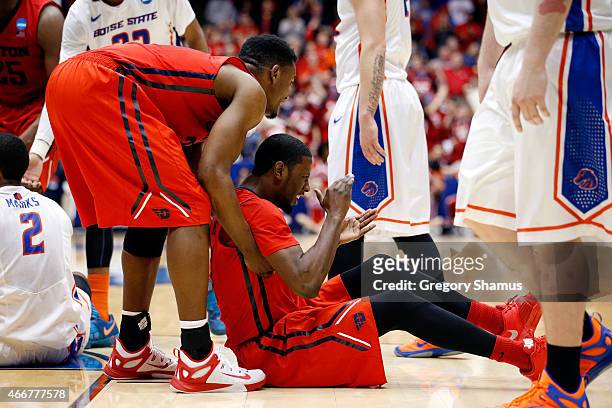 Scoochie Smith of the Dayton Flyers reacts against the Boise State Broncos during the first round of the 2015 NCAA Men's Basketball Tournament at UD...