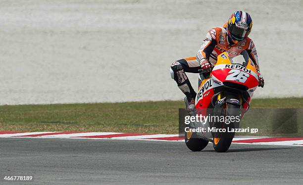 Dani Pedrosa of Spain and Repsol Honda Team heads down a straight during the MotoGP Tests in Sepang - Day One at Sepang Circuit on February 4, 2014...