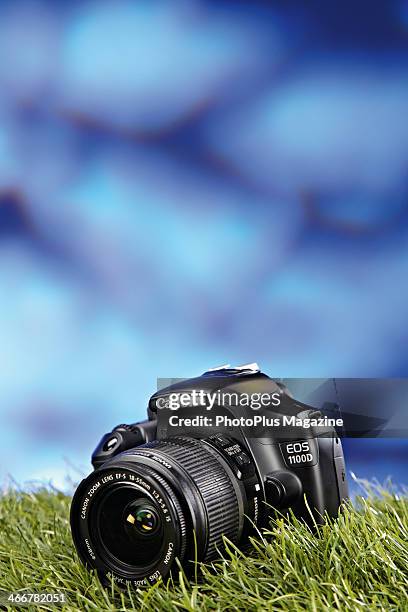 Portrait of a Canon EOS 1100D D-SLR camera photographed on a blue background, taken on May 15, 2013.