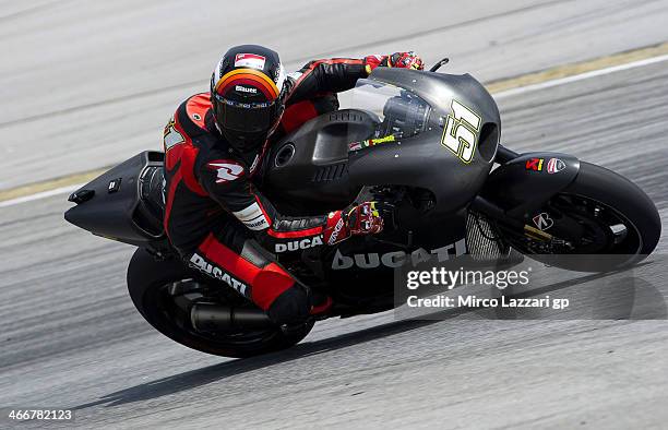 Michele Pirro of Italy and Ducati Test Team rounds the bend during the MotoGP Tests in Sepang - Day One at Sepang Circuit on February 4, 2014 in...