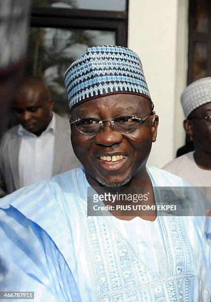 Aderogba Obisesa This picture taken on April 24, 2012 shows Nasarawa State Governor Umaru Al-Makura wearing a hat on traditional long robe and...