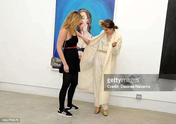 Lola Fruchtmann and artist Tali Lennox attend Tali Lennox Exhibition Opening Reception at Catherine Ahnell Gallery on March 18, 2015 in New York City.