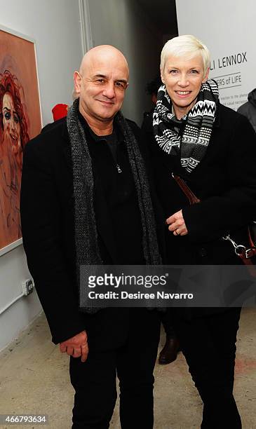 Philippe Achard and singer Annie Lennox attend Tali Lennox Exhibition Opening Reception at Catherine Ahnell Gallery on March 18, 2015 in New York...