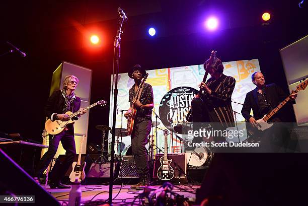 Guitarists Charlie Sexton, Gary Clark Jr., Eve Monsees and a guest bass player perform at the Austin Music Awards at the Austin Convention Center on...