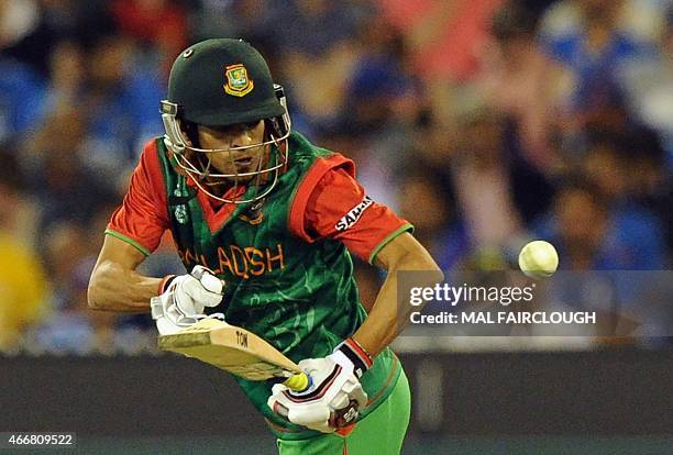 Bangladesh batsman Nasir Hossain plays a shot during the 2015 Cricket World Cup quarter-final match between India and Bangladesh at the Melbourne...