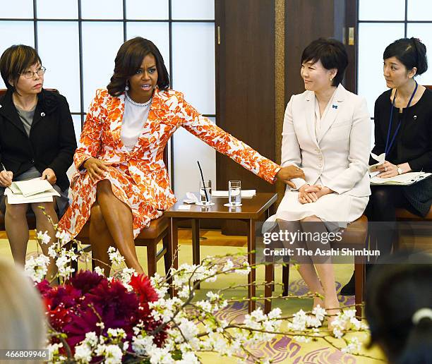 First lady Michelle Obama and Japanese first lady Akie Abe attend the Japan-U.S. Joint girls education event at Iikura Guest House on March 19, 2015...