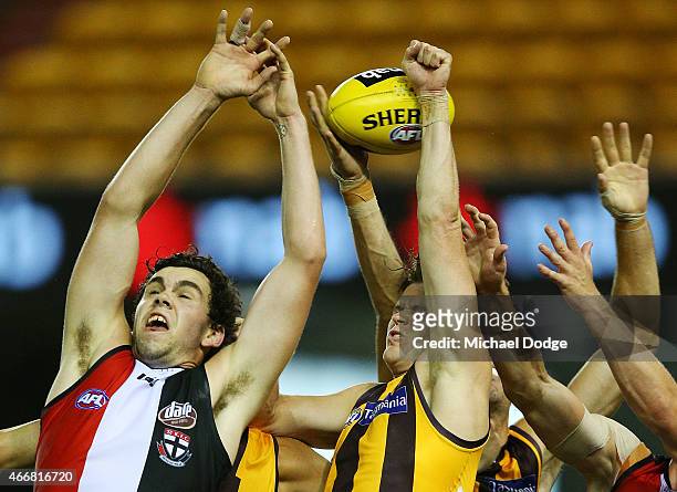 Paddy McCartin of the Saints and Taylor Duryea of the Hawks compete for the ball during the NAB Challenge AFL match between St Kilda Saints and...