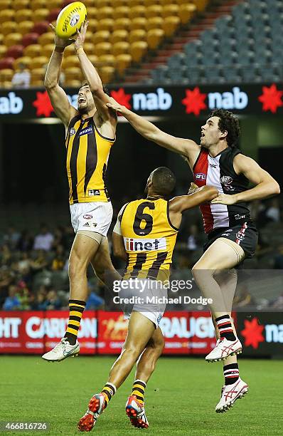Jack Gunston of the Hawks marks the ball against Paddy McCartin of the Saints of the Saints during the NAB Challenge AFL match between St Kilda...