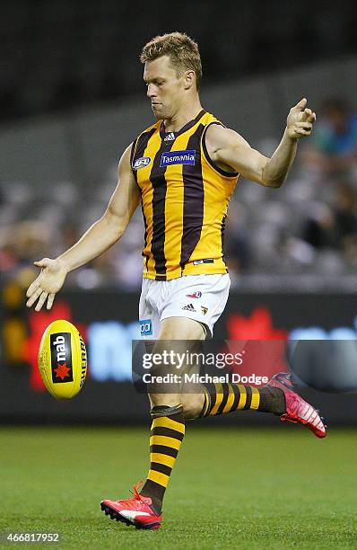 Sam Mitchell of the Hawks kicks the ball during the NAB Challenge AFL match between St Kilda Saints and Hawthorn Hawks at Etihad Stadium on March 19,...