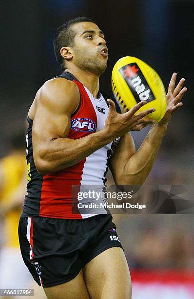 Ahmed Saad of the Saints marks the ball during the NAB Challenge AFL match between St Kilda Saints and Hawthorn Hawks at Etihad Stadium on March 19,...