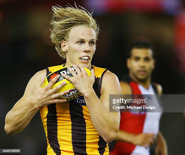 Will Langford of the hawks marks the ball during the NAB Challenge AFL match between St Kilda Saints and Hawthorn Hawks at Etihad Stadium on March...