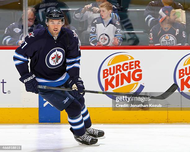 Eric Tangradi of the Winnipeg Jets takes part in the pre-game warm up prior to NHL action against the Edmonton Oilers at the MTS Centre on January...