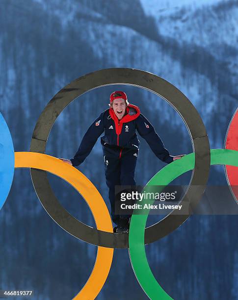 Ben Kilner of the Great Britain Snowboard Team poses for a portrait on the Olympic rings at the Athletes Village in the Rosa Khutor mountain village...