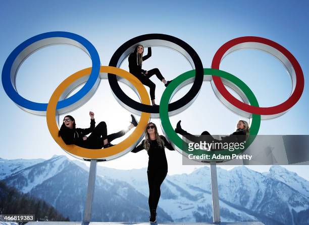 Shelly Gotlieb, Stefi Luxton, Christy Prior and Rebecca Torr of New Zealand pose for a picture at the with the Olympic Rings at Athletes Village...