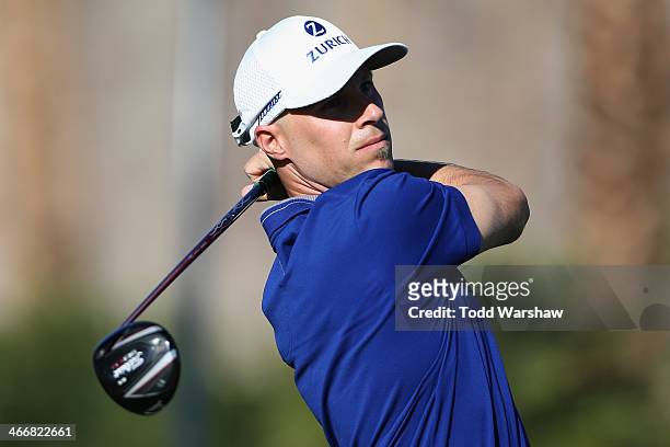 Ben Crane hits a shot on the 11th hole at La Quinta Country Club Course during the first round of the Humana Challenge in partnership with the...