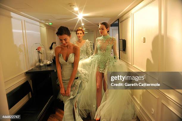Models backstage before the Tony Yaacoub show as part of Paris Fashion Week Haute-Couture Spring/Summer 2014 at the W Hotel on January 22, 2014 in...