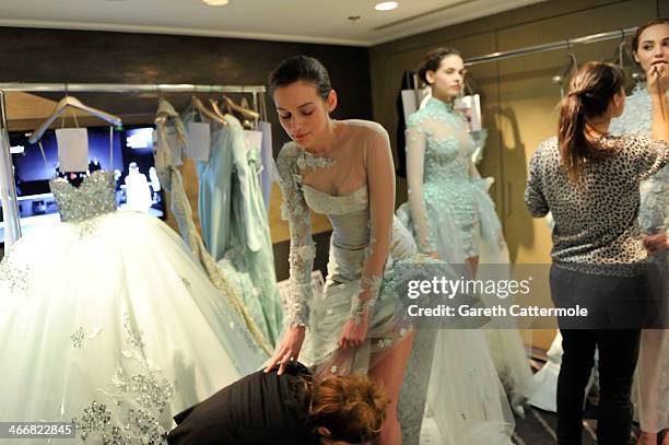 Models backstage before the Tony Yaacoub show as part of Paris Fashion Week Haute-Couture Spring/Summer 2014 at the W Hotel on January 22, 2014 in...