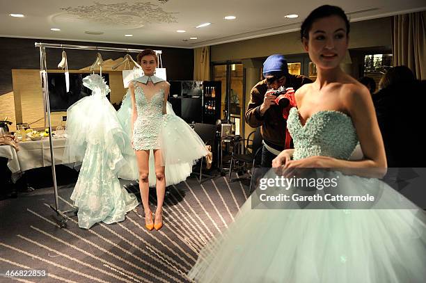 Models backstage before the Tony Yaacoub show as part of Paris Fashion Week Haute-Couture Spring/Summer 2014 at the W Hotel on January 22, 2014 in...