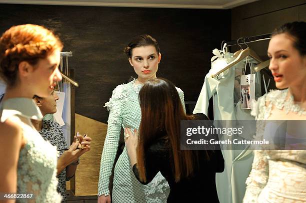 Models backstage before the Tony Yaacoub show as part of Paris Fashion Week Haute-Couture Spring/Summer 2014 at the W Hotel on January 22, 2014 in...