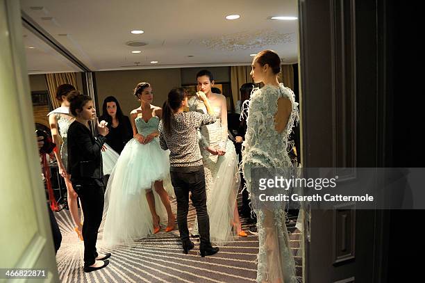 Models backstage before the Tony Yaacoub show as part of Paris Fashion Week Haute-Couture Spring/Summer 2014 at the W Hotel on January 22, 2014 in...
