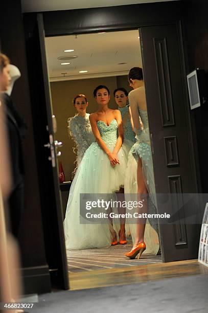 Models backstage before the Tony Yaacoub show as part of Paris Fashion Week Haute-Couture Spring/Summer 2014 at the W Hotel on January 22, 2014 in...