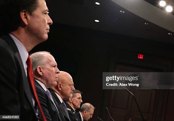 Director James Comey, Central Intelligence Agency Director John Brennan, Director of National Intelligence James Clapper, Lt. Gen. Michael Flynn,...