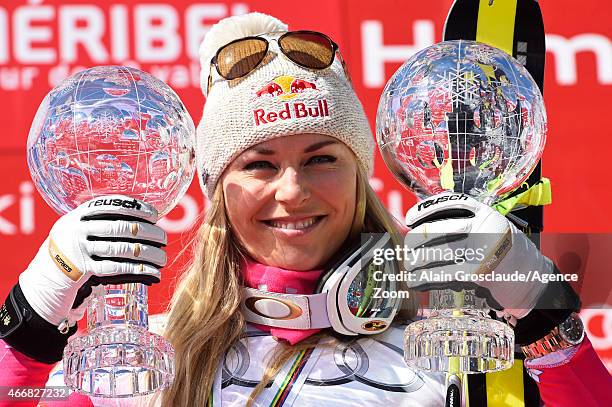 Lindsey Vonn of the USA wins the overall SuperG and Downhill World Cup globes during the Audi FIS Alpine Ski World Cup Finals Women's Super G on...