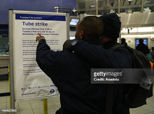 Tube strike notice is seen at the underground station in London on February 3, 2014. Members of the Rail Maritime Transport Workers Union and The...