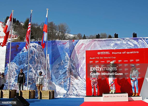 Anna Fenninger of Austria, Lindsey Vonn of The USA and Tina Maze of Slovenia stand on the podium the FIS Alpine Ski World Cup women's Super-G overall...