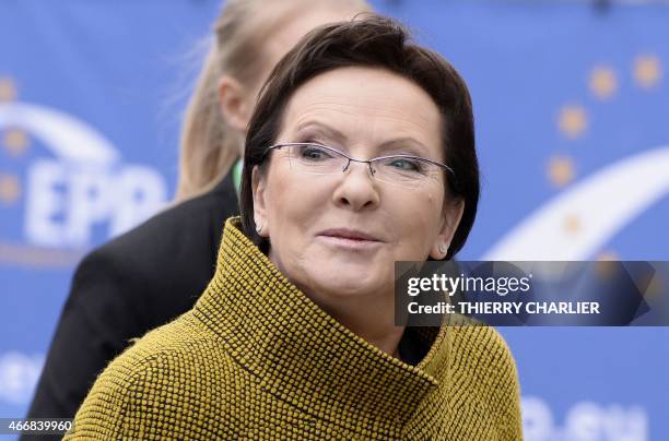 Polish Prime Minister Ewa Kopacz arrives for an European People's Party meeting ahead of a European leaders summit in Brussels on March 19, 2015. AFP...