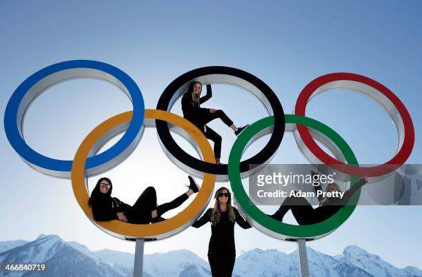 Shelly Gotlieb, Stefi Luxton, Christy Prior and Rebecca Torr of New Zealand pose for a picture with the Olympic Rings at Athletes Village ahead of...