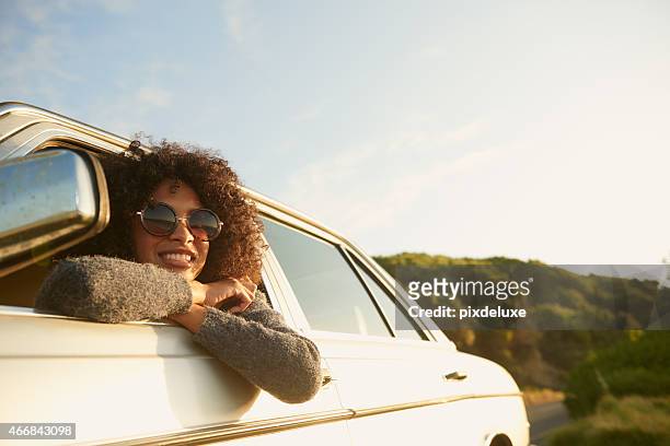 loving this road trip! - people in car stockfoto's en -beelden