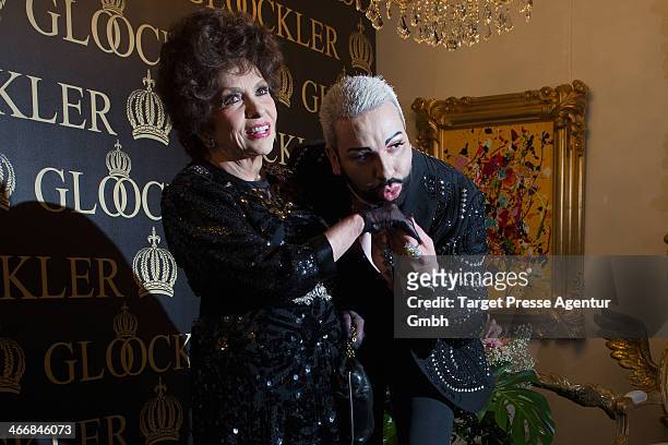 Designer Harald Gloeoeckler and Gina Lollobrigida clebrate their 20 years of friendship at the Harald Gloeoeckler Gallery on February 4, 2014 in...