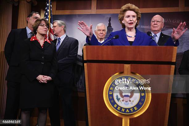 Sen. Debbie Stabenow speaks as Sen. John Boozman , Sen. Amy Klobuchar , Sen. John Hoeven , Sen. Thad Cochran , and Sen. Patrick Leahy listen during a...