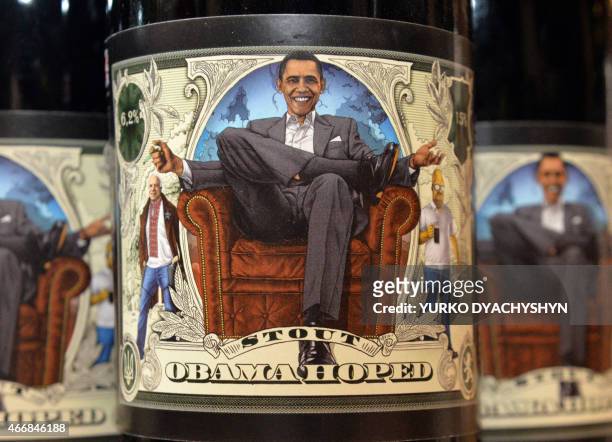 Closeup taken at the Beer Theater, a restaurant in the western Ukrainian city of Lviv, shows on March 19, 2015 a bottle of Obama Hoped stout brewed...