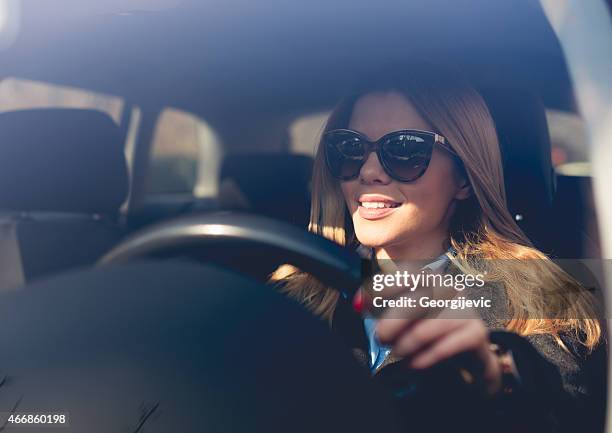 female driver - luxury cars stock pictures, royalty-free photos & images