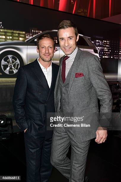Wotan Wilke Moehring and Kai Pflaume attend the Audi City Berlin Opening on February 4, 2014 in Berlin, Germany.