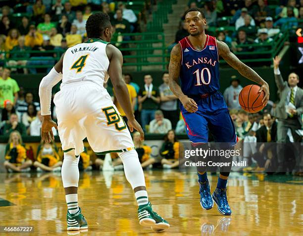 Naadir Tharpe of the Kansas Jayhawks brings the ball up court against the Baylor Bears on February 4, 2014 at the Ferrell Center in Waco, Texas.