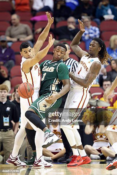 Chris Cokley of the UAB Blazers fights for the ball agaist Naz Long and Jameel McKay of the Iowa State Cyclones during the second round of the 2015...