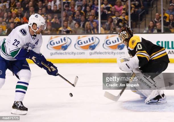 Tuukka Rask of the Boston Bruins makes a save on a shot Daniel Sedin of the Vancouver Canucks in the 1st period at TD Garden on February 4, 2014 in...