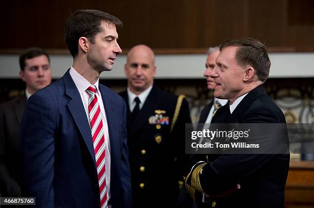 Sen. Tom Cotton, R-Ark., left, talks with Navy Adm. Michael Rogers, before a Senate Armed Services Committee hearing in Dirksen Building titled "U.S....