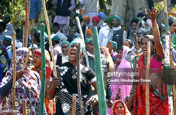 Women farmers gather in the heart of the capital protesting against the Land Acquisition Bill on March 19, 2015 in New Delhi, India. Modi led NDA...