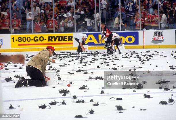 General view of workers cleaning up the plastic rats after a goal was scored by the Florida Panthers during Game 3 of the 1996 Stanley Cup Finals...
