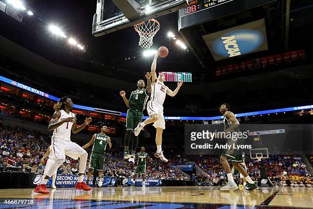 Matt Thomas of the Iowa State Cyclones goes to the hoop against Chris Cokley of the UAB Blazers during the second round of the 2015 NCAA Men's...