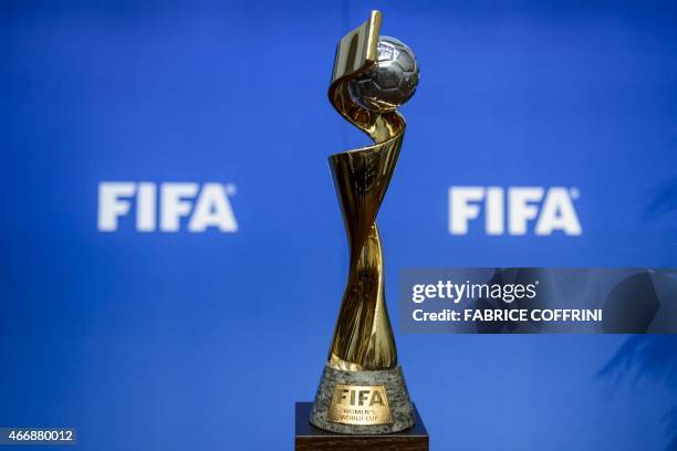 The trophy of the FIFA women's fooball World Cup is displayed on March 19, 2015 in Zurich after the FIFA's executive committee decided that France...