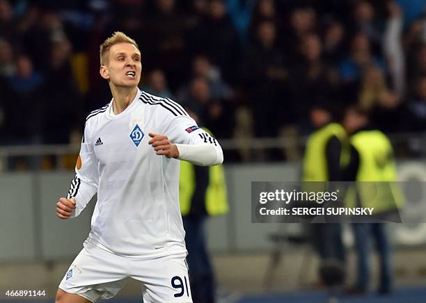 Dynamo Kiev's Lukasz Teodorczyk celebrates after scoring on March 19, 2015 during a UEFA Europa League, Round of 16 football match FC Dynamo vs....