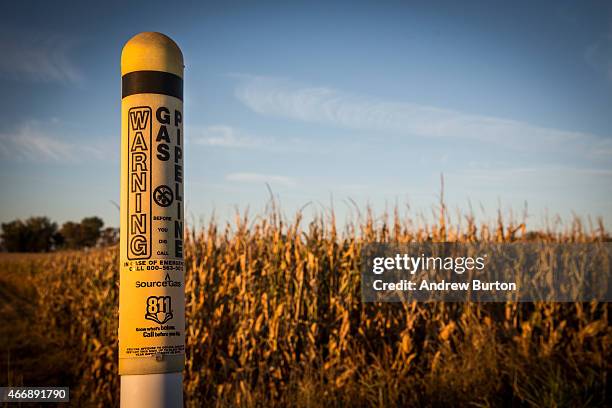 Warning sign alerting people to an existing gas pipeline is seen near the "Clean Energy Barn," which was built directly in the path of the proposed...